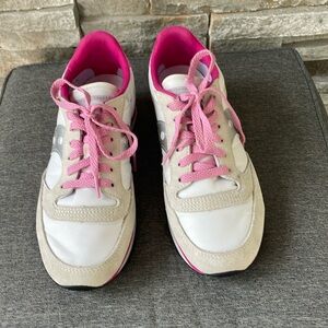 Pink and white Saucony.